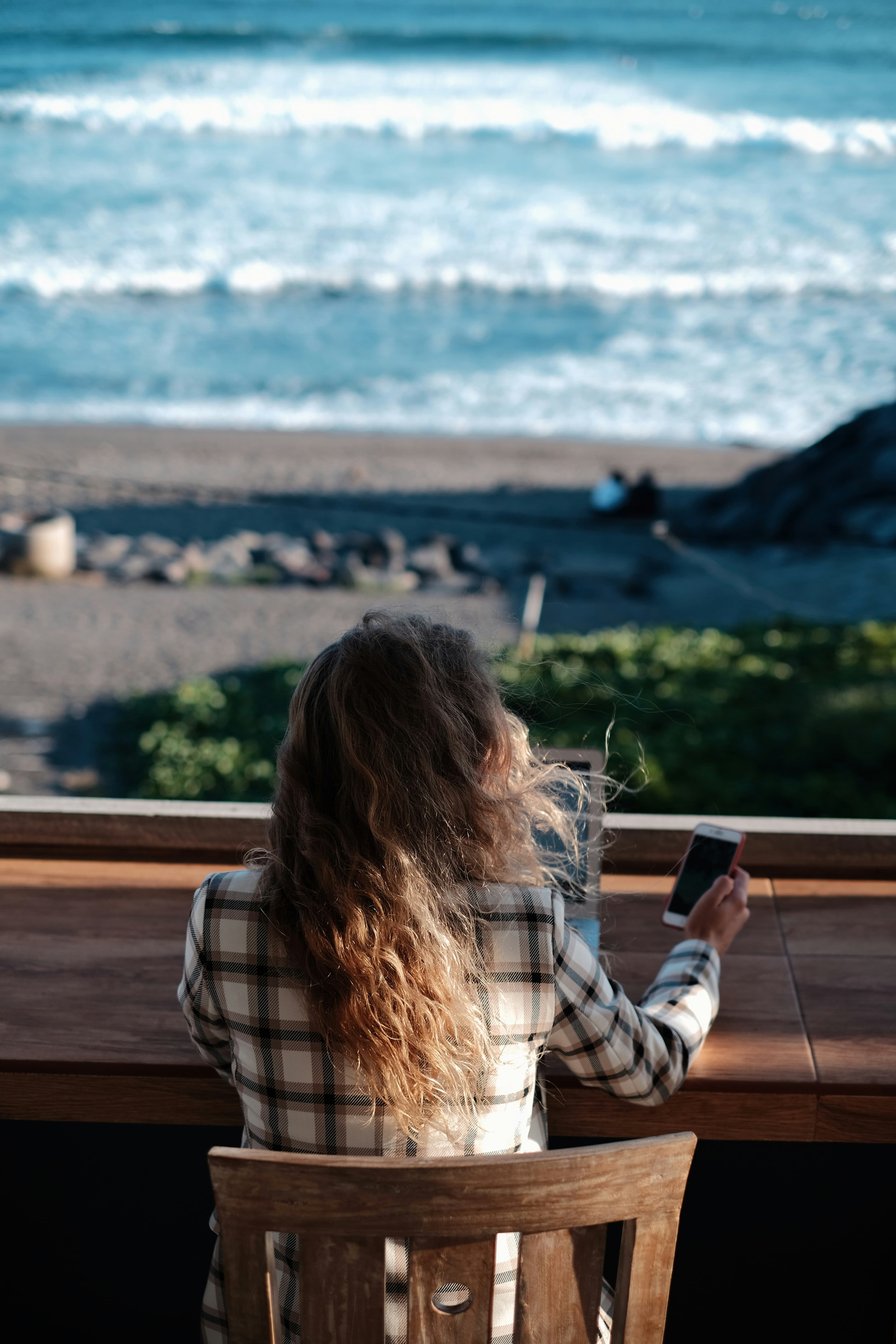 Entrepreneur working remotely with a view — Unicornin60 fits any lifestyle